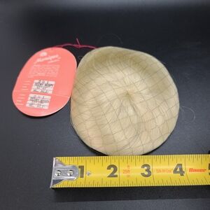 Monique Collections BEBE 10"-11" Blonde.